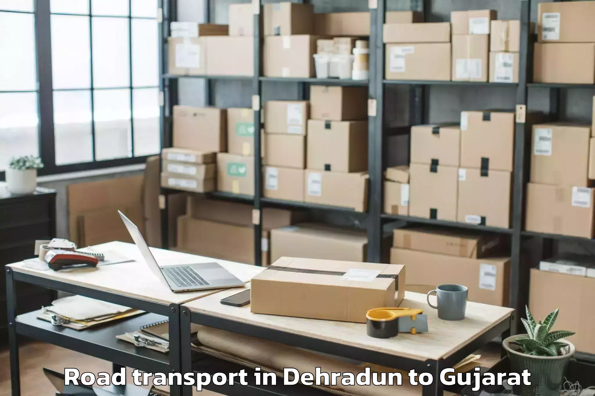 Book Dehradun to Adalaj Road Transport